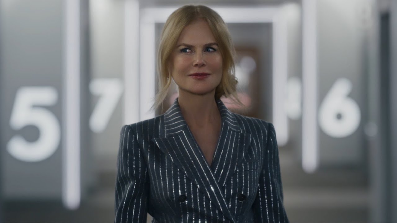 AMC viral ad WE MAKE MOVIES BETTER / Michael Kors silver pinstriped jumpsuit worn by Nicole Kidman